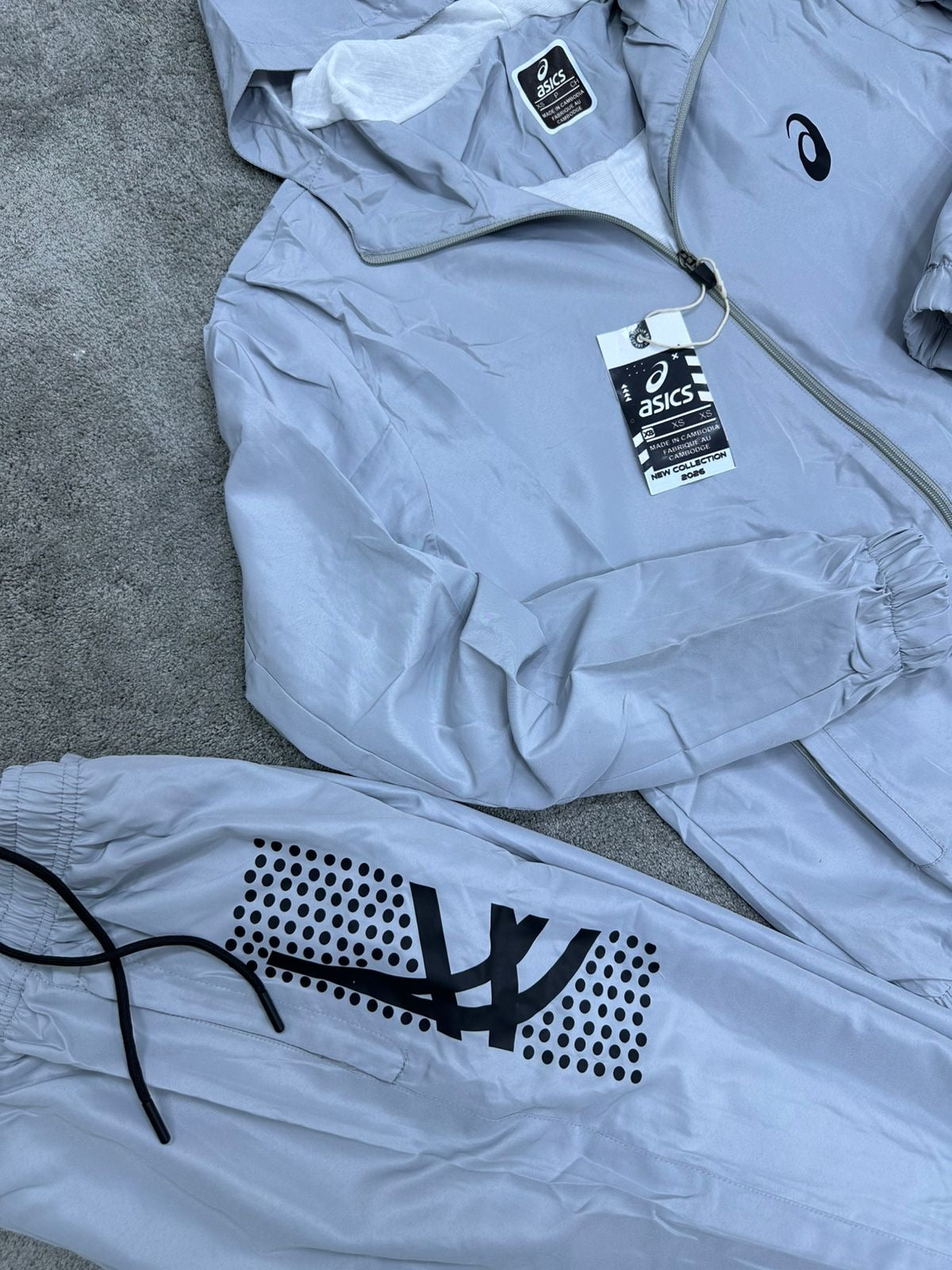 Chandal Asics *reflectante* gris