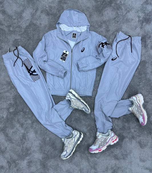 Chandal Asics *reflectante* gris